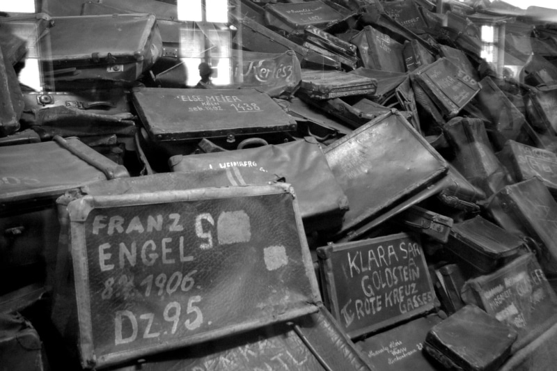 large group of objects, birkenau, non-western script, museum, indoors, stack, day, message, camp, war, number, sign, poland, still life, concentration camp