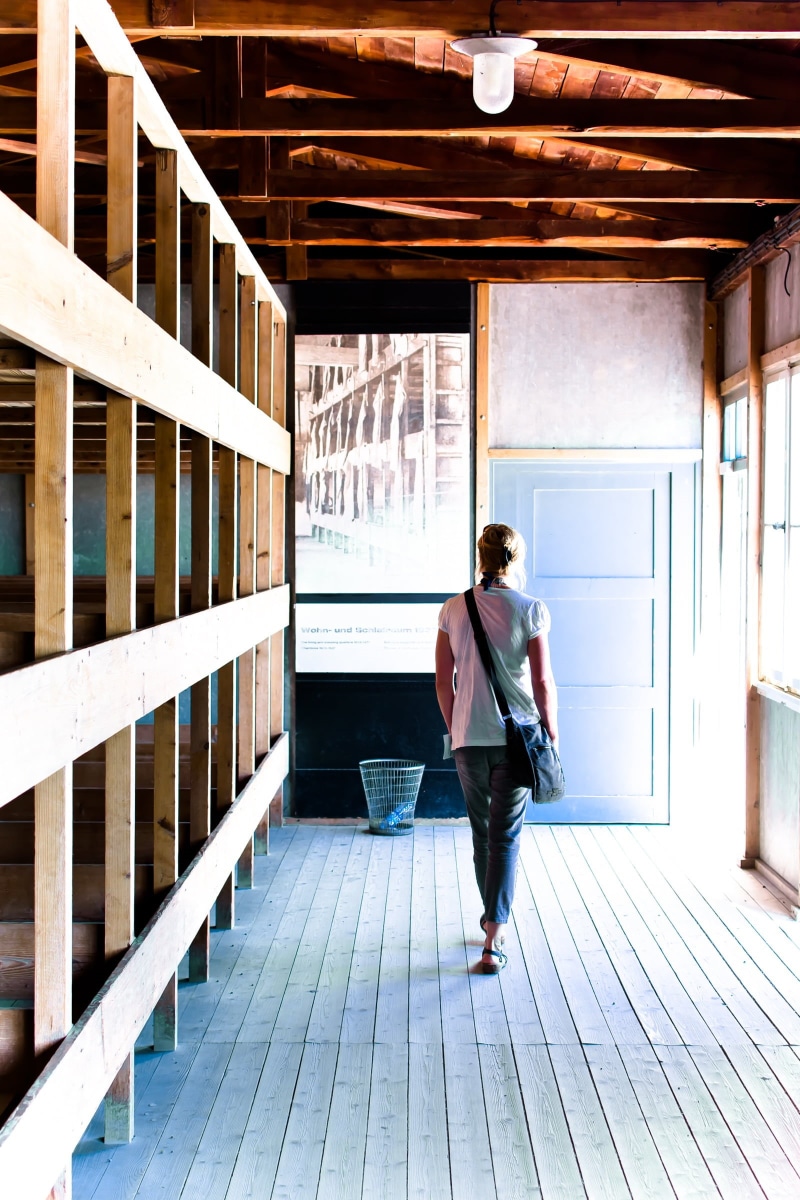 kz, dormitory, indoors, adult, building, one person, go, rear view, real people, konzentrationslager, railing, tourist information, standing, architecture