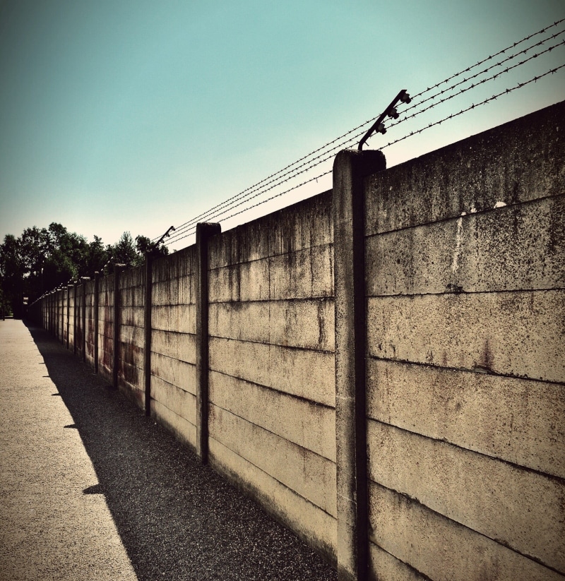 shadow, the way forward, transportation, direction, wall, terrible, memorial, outdoors, clear sky, connection, wire, sky, empty, cruel, past, built structure