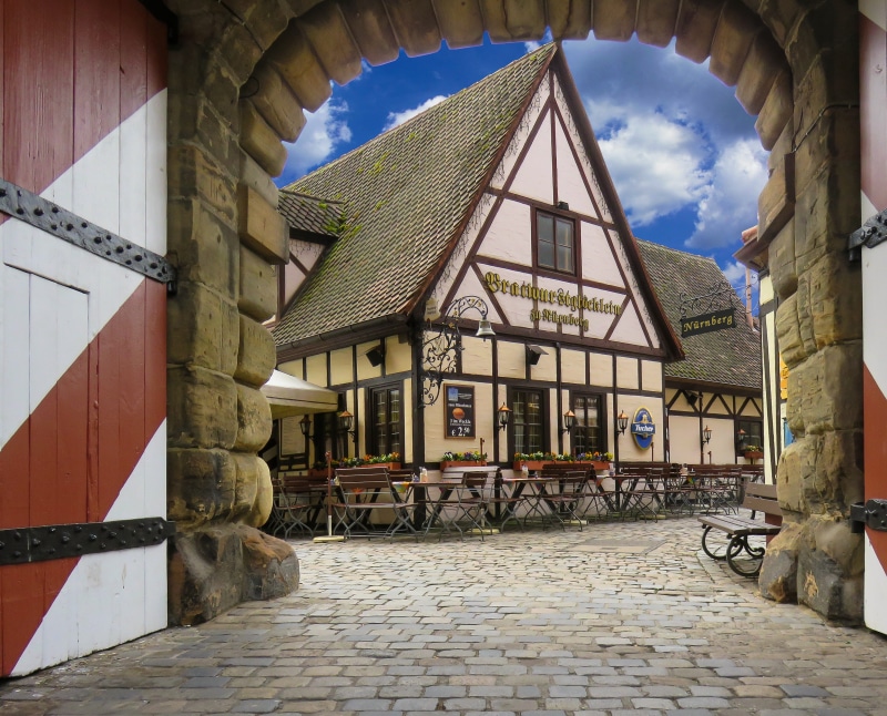 historically, sausages, residential district, cloud - sky, built structure, ancient times, sky, tourism, no people, truss, building exterior, protection