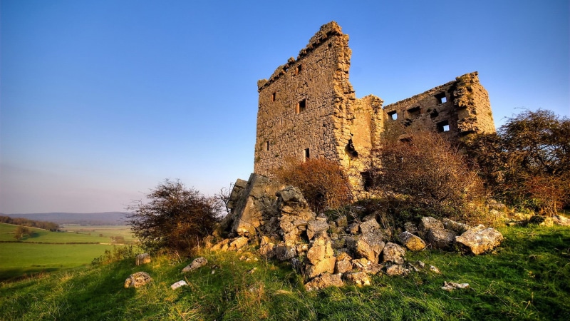 field, palace, house, defensive structure, exterior, historic, church, fortress, history, the past, building, land, clear sky, tourism, plant, town, tree