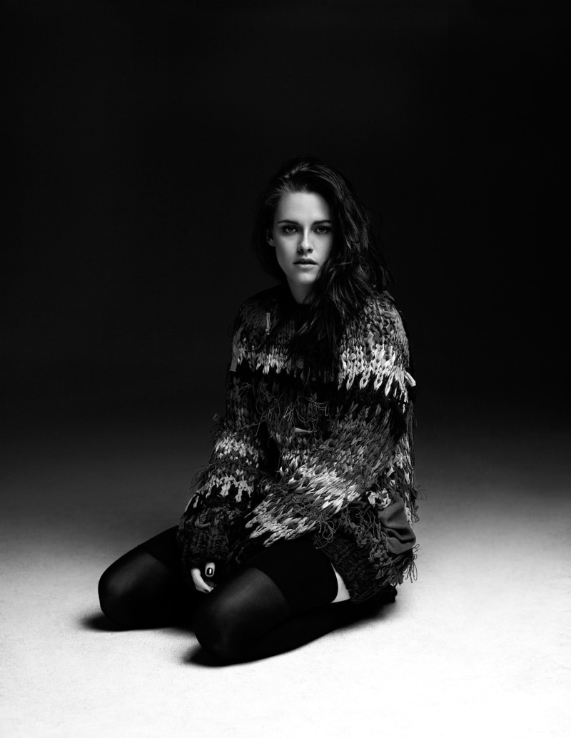 hairstyle, portrait, luxury, sitting, beauty, adult, black background, full length, Kristen Stewart, dark, hair, fashion model, looking at camera, studio shot