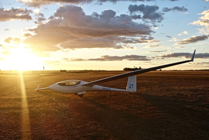 transportation, outdoors, orange color, Glider, no people, sunlight, Aircraft, beauty in nature, Sunset, sun, sunbeam, land, cloud - sky, Fun, dom, sport