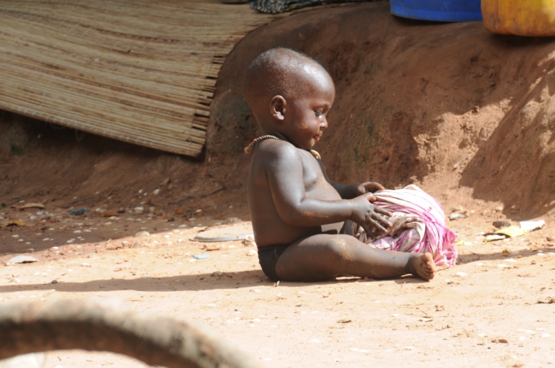 casual clothing, males, sitting, men, shirtless, misery, pink, ground, poverty, real people, black, nature, leisure activity, 4K, alone, bissau, full length