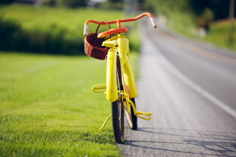 no people, vehicle, metal, absence, yellow, nature, orange, path, macro, sunlight, wheel, 1080P, stationary, green color, grass, plant, mode of transportation