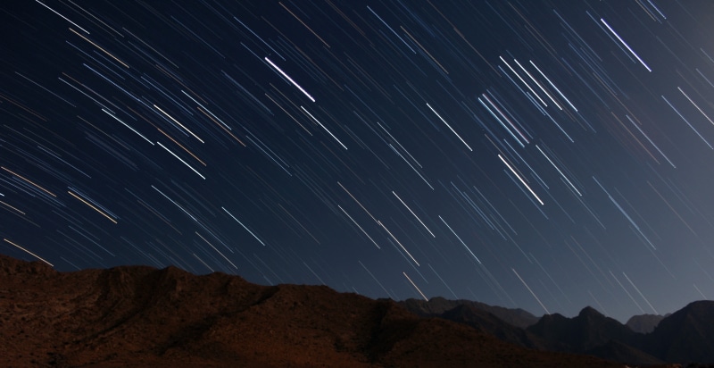 nature, infinity, tranquil scene, star field, space and astronomy, sky, night, mountains, outdoors, long exposure, space, mountain, constellation, tranquility
