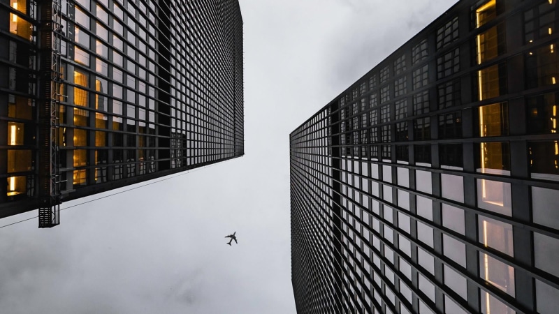 tower block, tall - high, reflection, day, daylighting, city, building, cloud - sky, bottom view, outdoors, built structure, low angle view, tower, window