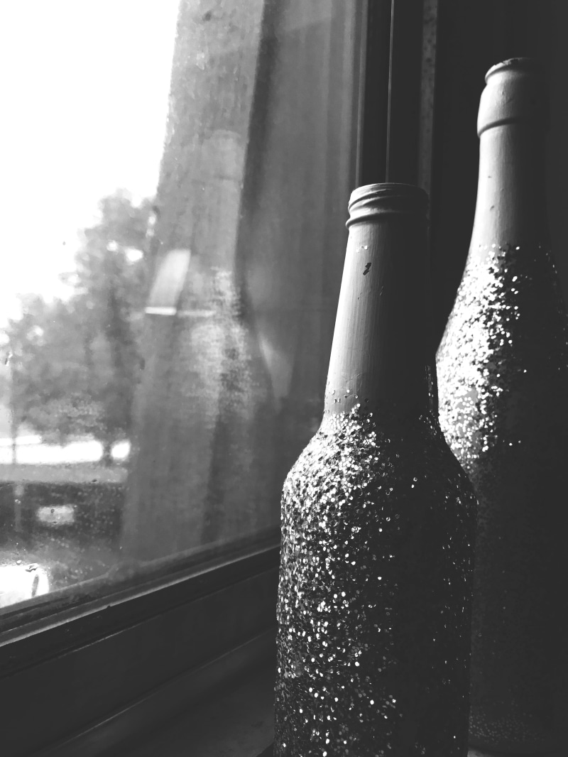 black and white, alcohol, indoors, apartment, bottle, sad, focus on foreground, container, drink, day, glitter, dreary, 4K, black, chesterton, glass - material