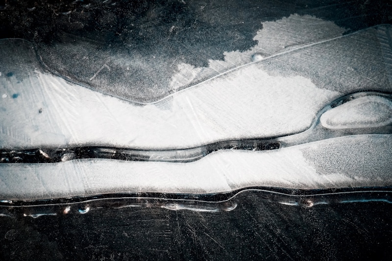 lines, mode of transportation, close-up, snow, cold temperature, water, transportation, frozen, mood, cold, fabric, ice, road, day, white color, structure