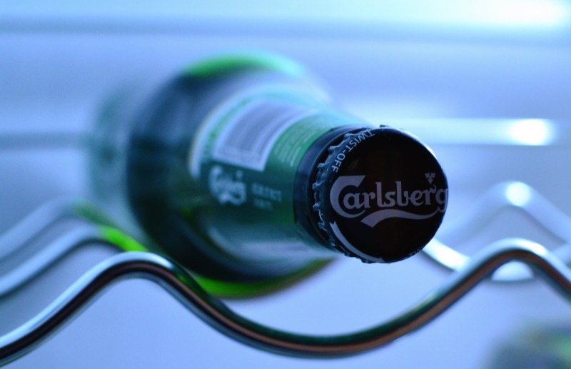 photography, focus, alcohol, close-up, glass, arts culture and entertainment, cold, label, still life, carlsberg, drink, cool, finance, number, fresh, carlsbera