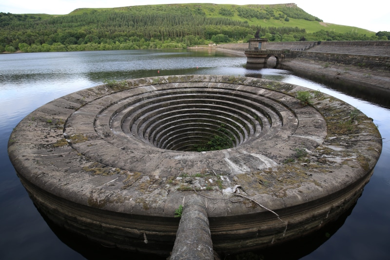 plant, ladybower reservoir, circle, reflection, river, day, tree, outdoors, geometric shape, stone, shape, high angle view, tranquility, spillway, sky