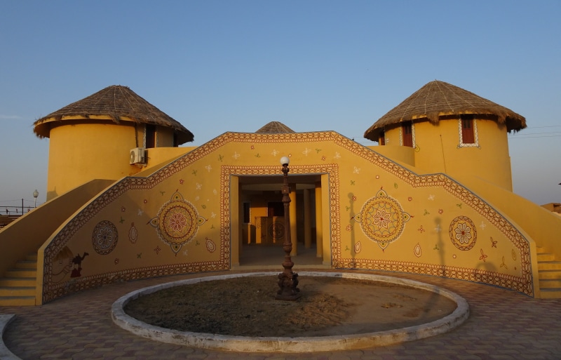 mud, bhunga, ornate, walking, water, rear view, cottage, clear sky, gujarat, rann of kutch, roof, built structure, men, ecology, traditional, grk, conical