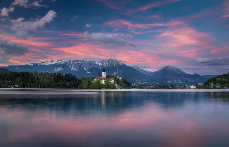 snowcapped mountain, tree, no people, beauty in nature, sky, The Julian Alps, lake, cloud - sky, water, Lake Bled, non-urban scene, tranquility, 2K, outdoors