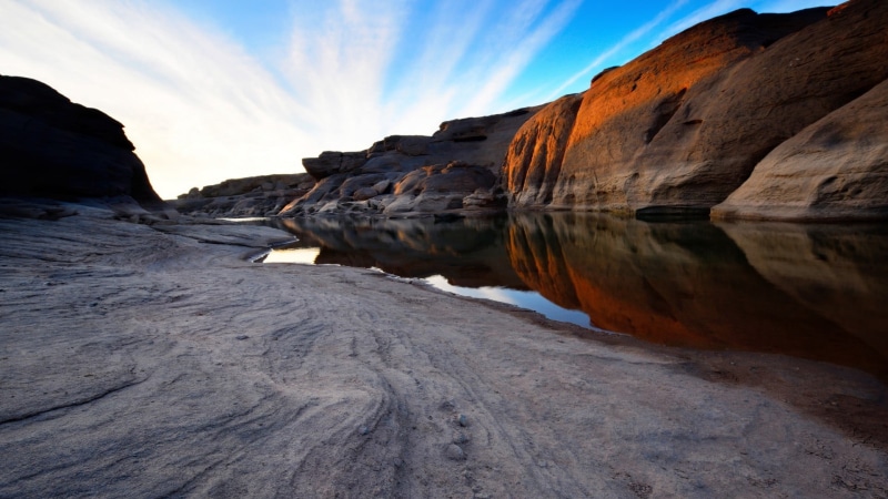 outdoors, water, travel destinations, beach, environment, eroded, mountains, no people, scenics - nature, nature, solid, beauty in nature, rock formation