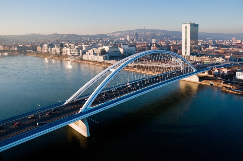 arch bridge, sky, car, transportation, no people, city, building, high angle view, travel, built structure, water, bridge, outdoors, travel destinations