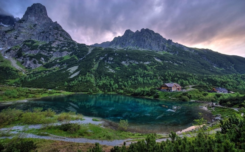 nature, forest, outdoors, environment, cabin, plant, mountains, emerald, sky, no people, lake, cloud - sky, scenics - nature, land, reflection, water, dirt road
