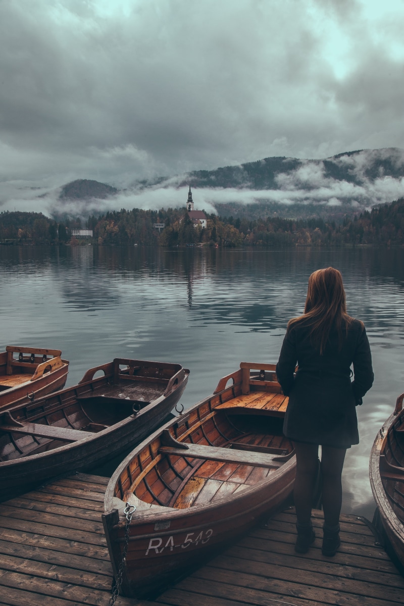 wooden, watercraft, one person, lifestyles, vehicle, vanlife, canoe, nature, clothing, nomadlife, rowboat, moored, slovenia, travel, bled, grey, cloudy