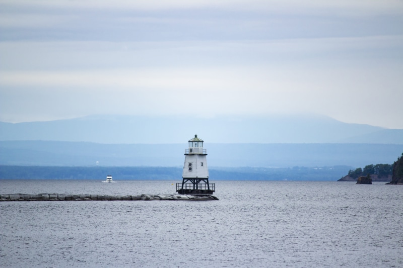tower, built structure, burlington, guidance, protection, no people, blue, usa, outdoors, waterfront, white, beauty in nature, serenity, safety, nature