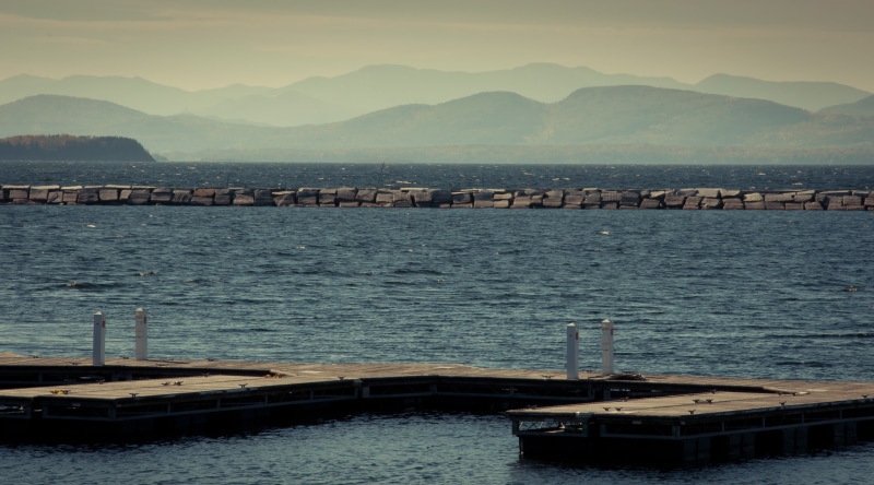 building exterior, outdoors, nautical vessel, mode of transportation, Lake, scenics - nature, day, beauty in nature, mountain range, waterfront, lakechamplain