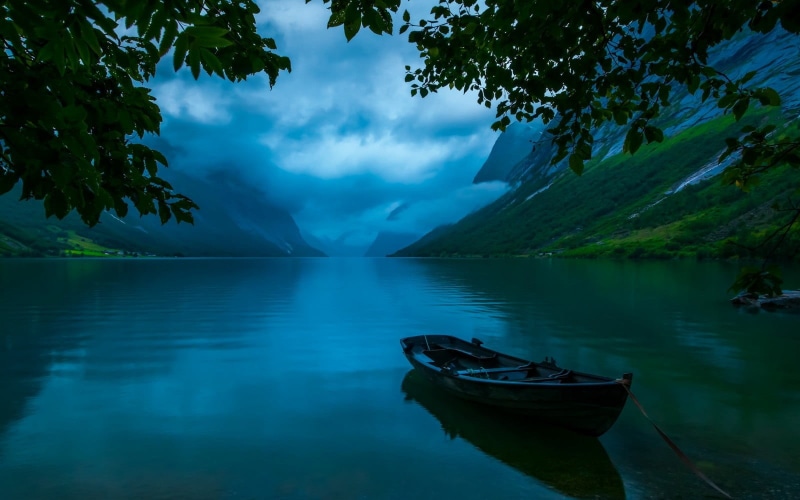 no people, reflection, mode of transportation, boat, trees, sky, scenics - nature, tranquility, lake, beauty in nature, blue, landscape, grey, nature, clouds