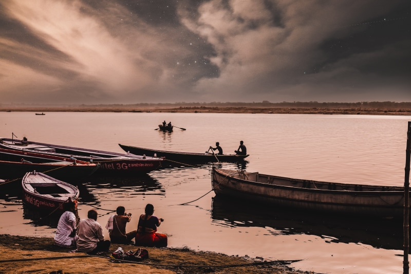 mode of transportation, cloud - sky, nature, horizon, river bank, Worship, canoe, Varanasi, beach, real people, scenics - nature, Ganges River, human, Assi Ghat