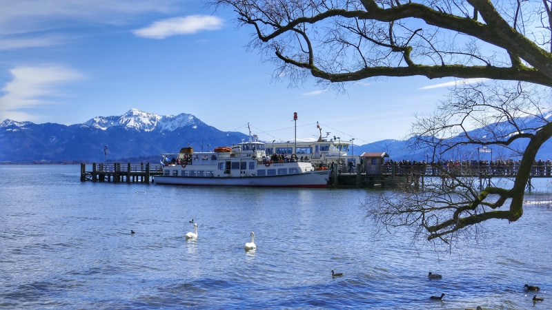 mode of transportation, tourism, sea, boat, mountains, scenics - nature, horizontal, outdoors, bavaria, tree, bird, travel, waterfront, snowcapped mountain