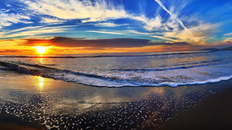 motion, horizon, sun, reflection, beauty in nature, beach, tranquil scene, idyllic, wave, land, sunset, no people, tranquility, outdoors, sea, dawn, water