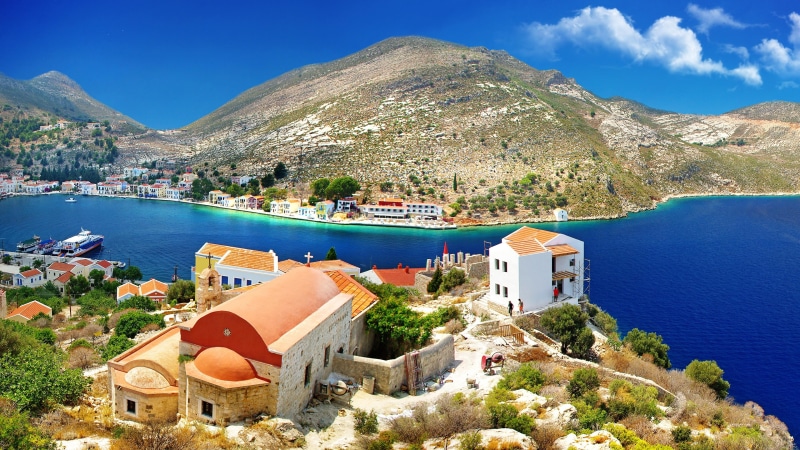 leisure, building exterior, blue sea, sky, outdoors, beauty in nature, mountain, water, no people, day, building, sea, mountain range, lake, 4K, promontory