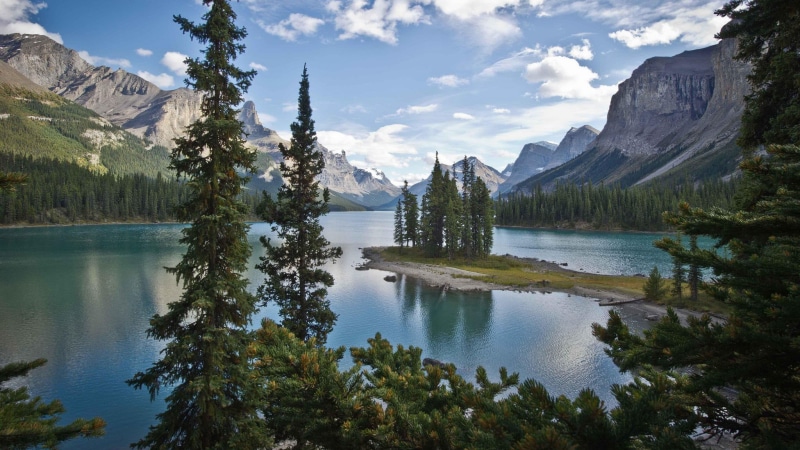 non-urban scene, pine tree, tranquil scene, scenics - nature, travel destinations, mountain, tree, water, nature, house, lake, tranquility, concrete, formation