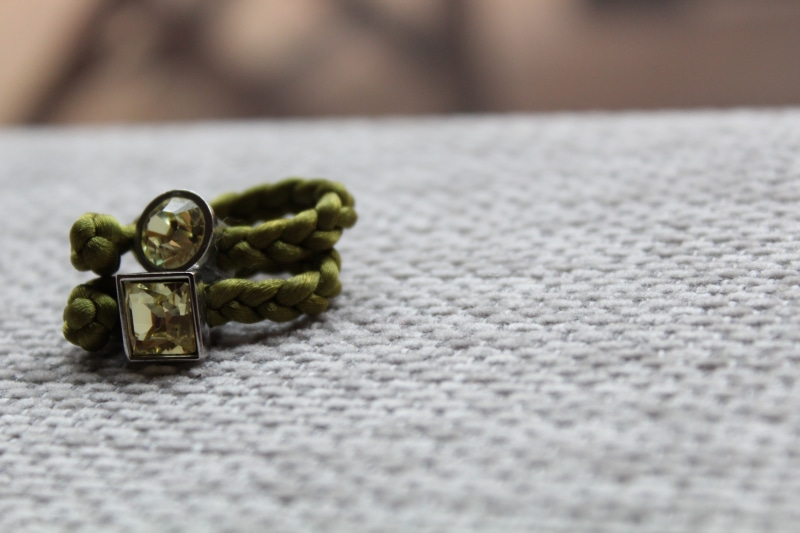 gold, luxury, single Object, decoration, focus on foreground, gift, tilt shift, no people, still life, craft, 5K, bracelets, close-up, elegance, religion