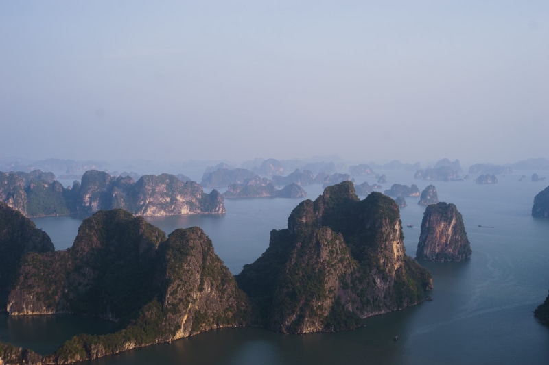 non-urban scene, rock formation, tranquility, travel, asia, beauty in nature, sky, tranquil scene, explore, fog, adventure, ha long bay, bai tho (poem) mountain