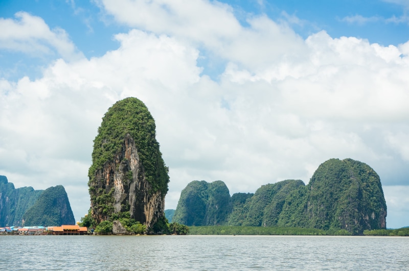 bay, no people, sea, rock formation, nature, cloud - sky, limestone cliff, mountain, floating village, rock, nautical vessel, island, vacation, muslim