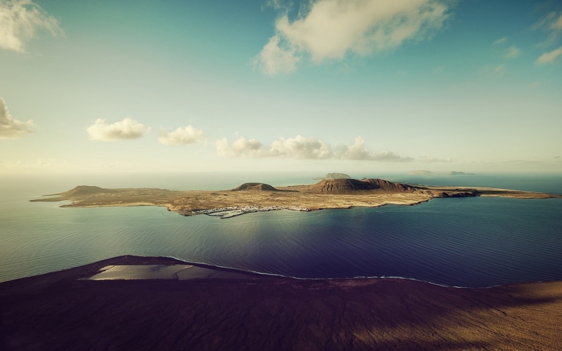 tourism, sea, mountain, scenics, water, volcanic Landscape, tranquility, islet, horizon over water, island, land, landscape, rock - Object, beach, cloud - sky