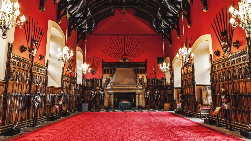 indoors, illuminated, palace, built structure, building, publication, luxury, lighting equipment, history, red, black, festival hall, architecture, scotland