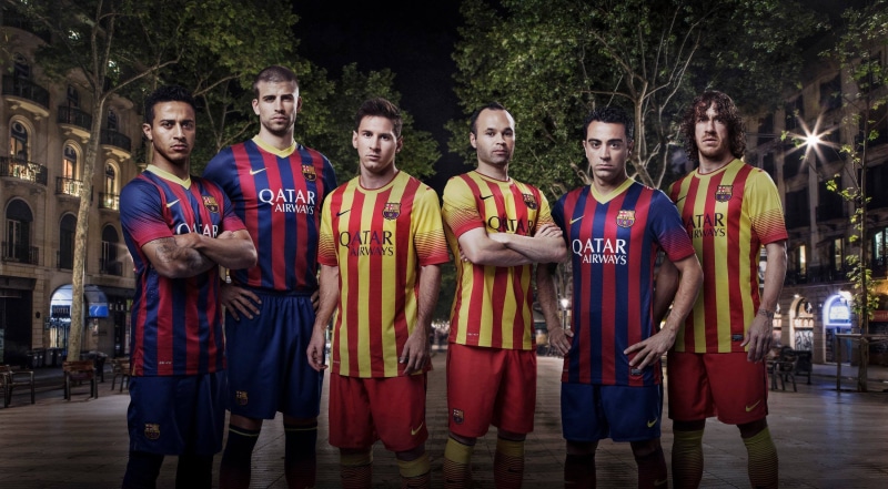 three quarter length, looking at camera, outdoors, red, males, men, young adult, 2K, day, medium group of people, FC Barcelona, Andrés Iniesta, standing