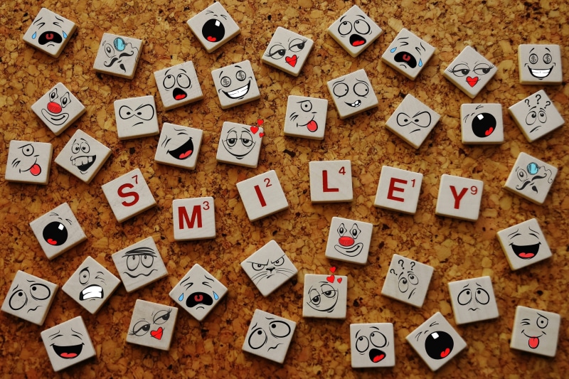 communication, faces, full frame, smiley, emotions, indoors, 2K, funny, still life, arts culture and entertainment, abundance, emoticon, choice, laugh