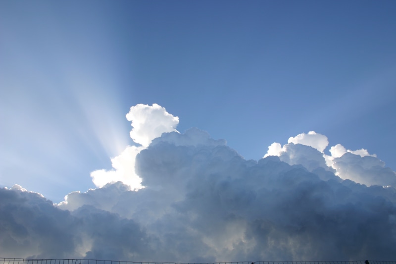 clouds, blue, 2K, scenics - nature, low angle view, environment, sunlight, copy space, rays, outdoors, sky, meteorology, white color, no people, crepuscular
