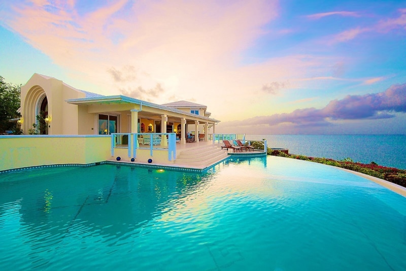 wealth, pool, luxury, tourist resort, summer, photography, architecture, sea, beauty in nature, nature, Turks and Caicos, resort, landscape, built structure