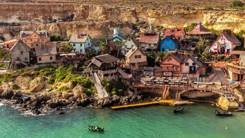 tourism, coatline, bay, village, 4K, film location, sweethaven village, city, water, sky, popeye village, danish village, coast, movie location, sea, rock