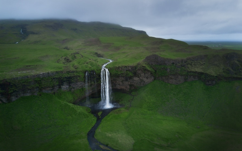 mountain, waterfall, non-urban scene, sky, flowing water, no people, green, green color, long exposure, landscape, tranquility, outdoors, water, plant