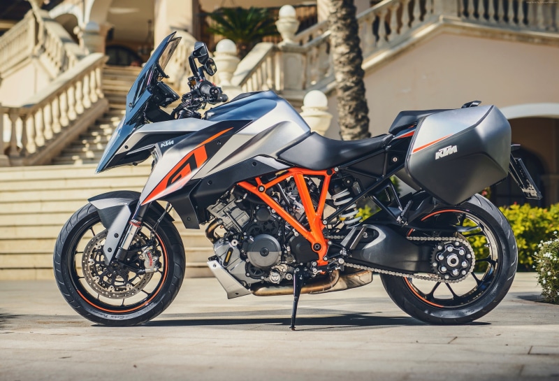 headwear, turing, built structure, outdoors, land vehicle, focus on foreground, parking, turing bike 2016, helmet, best bikes, motorcycle, KTM 1290 Super Duke GT