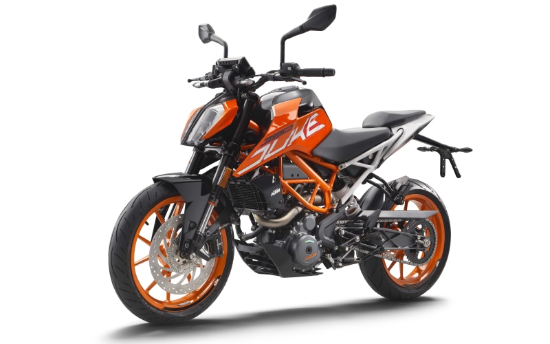 close-up, plastic, still life, KTM, indoors, Duke, bicycle, land vehicle, cut out, red, studio shot, metal, stationary, mode of transportation, wheel, black color