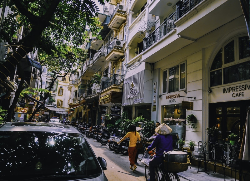 motor vehicle, car, architecture, traffic, pavement, city life, transportation system, downtown, transportation, tourism, town, real people, day, shopping