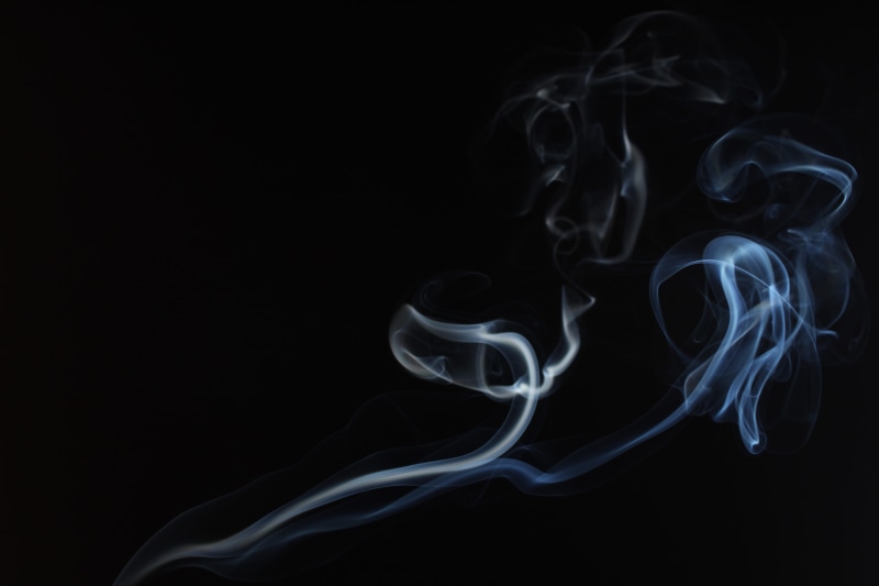 black, motion, mystery, burning, white, smoke - physical structure, studio shot, white color, close-up, fumes, vulnerability, changing form, flowing, indoors