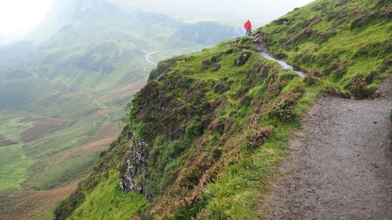quiraing, mountain peak, tranquil scene, scotland, adventure, grass, isle of skye, one person, leisure activity, beauty in nature, scenics - nature, landscape