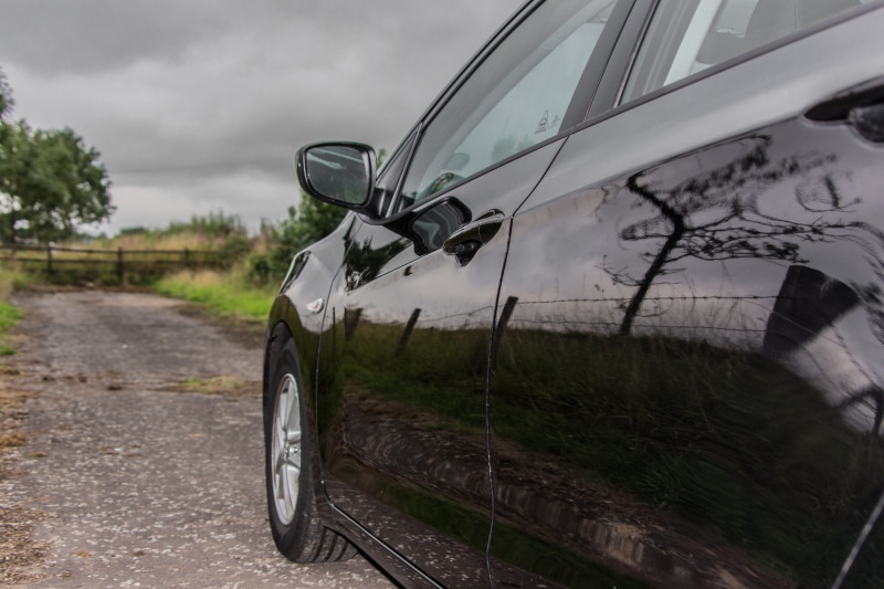 tree, clouds, mirror, wheel, dynamics, close up, gravel, dynamic range, car rental, wide angle, land, stationary, motor vehicle, partial view, i35, car