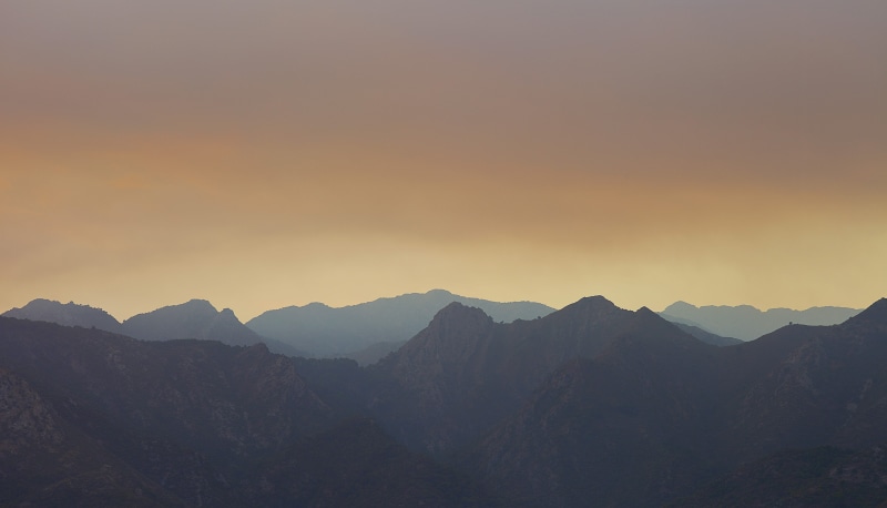 vast, scenics - nature, mountain, hike, no people, travel, adventure, tranquil scene, sublime, sunset, majestic, coniferous tree, light, horizon, silhouette