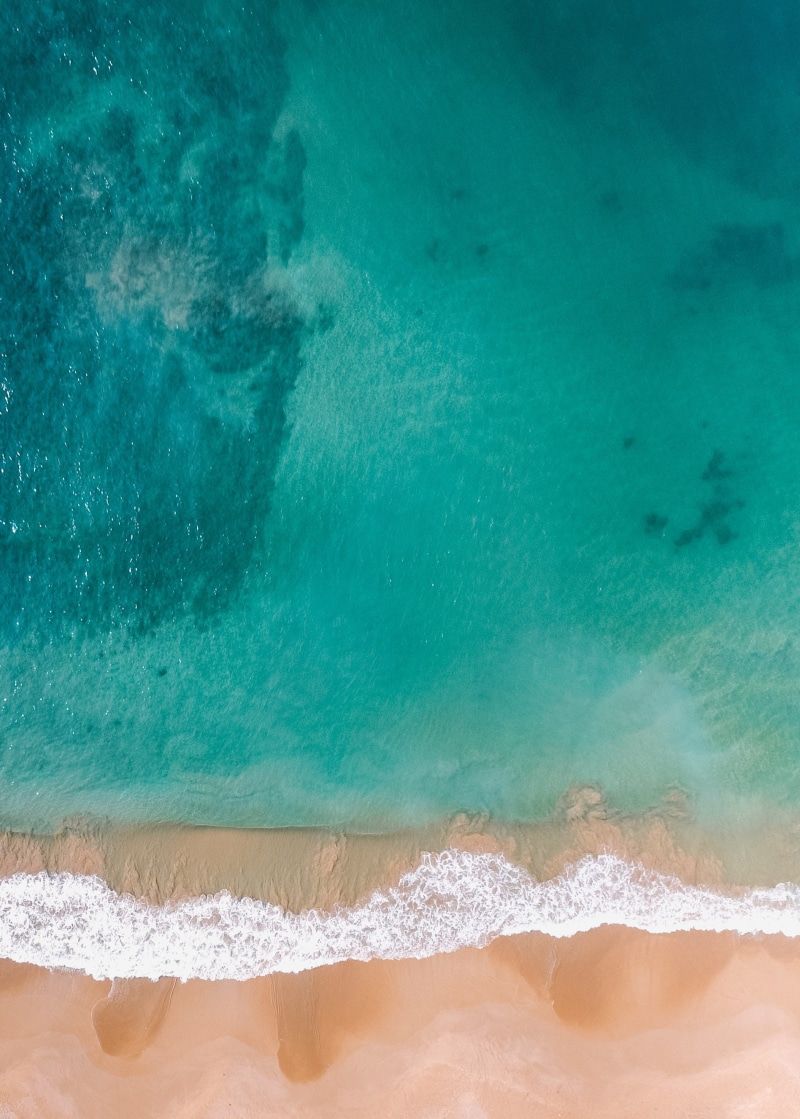 golden sand, sea, surfing, motion, beach, ocean, blue, aquatic sport, sand, sport, wave, nature, calm, swimming pool, high angle view, drone, land, outdoors