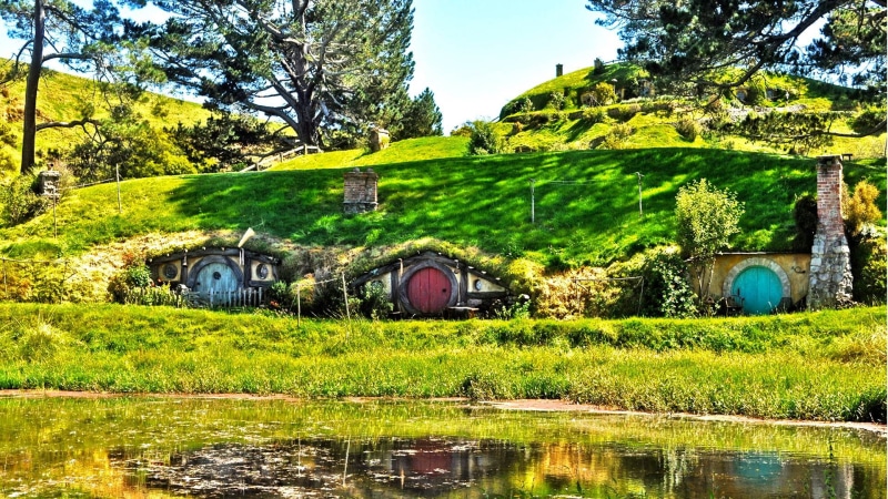 tranquility, 1080P, hobbiton, sky, growth, reflection, tree, day, built structure, tranquil scene, plant, grass, scenics - nature, nature, building, no people