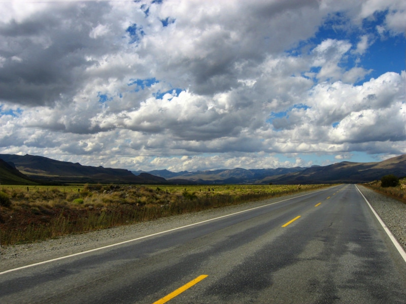 day, outdoors, transportation, sky, tranquil scene, no people, tranquility, direction, route, nature, mountain, environment, cielo, symbol, way, camino